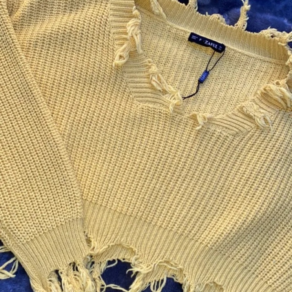 yellow ripped cropped yellow sweater